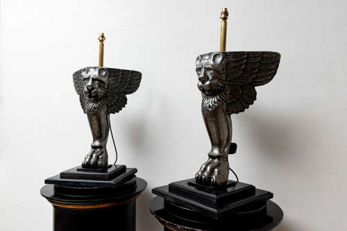 Pair of C19th cast iron winged lion lamps
