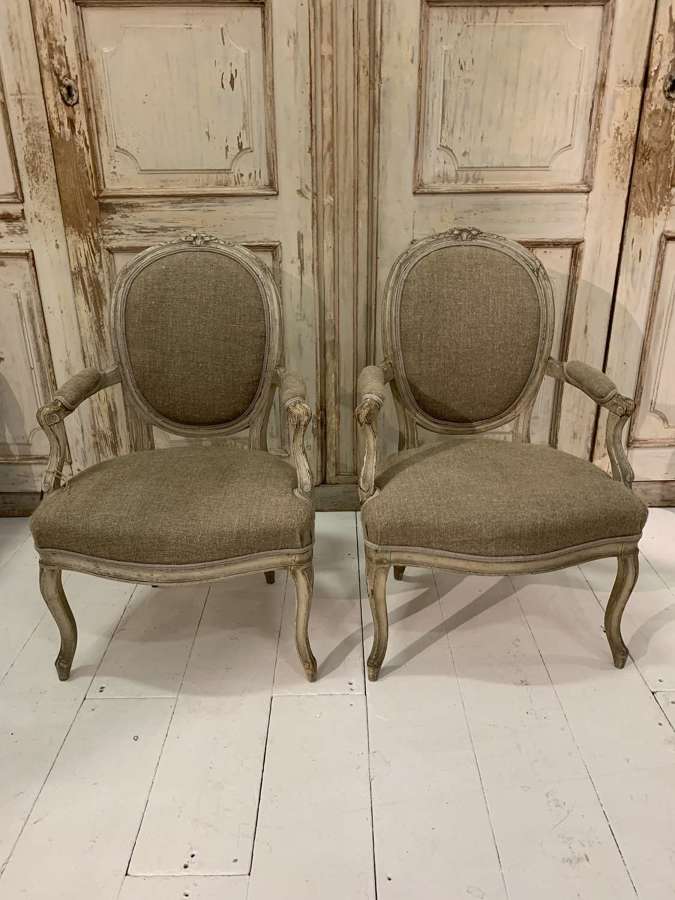 19th century pair of upholstered french fauteuils in Louis XVI style