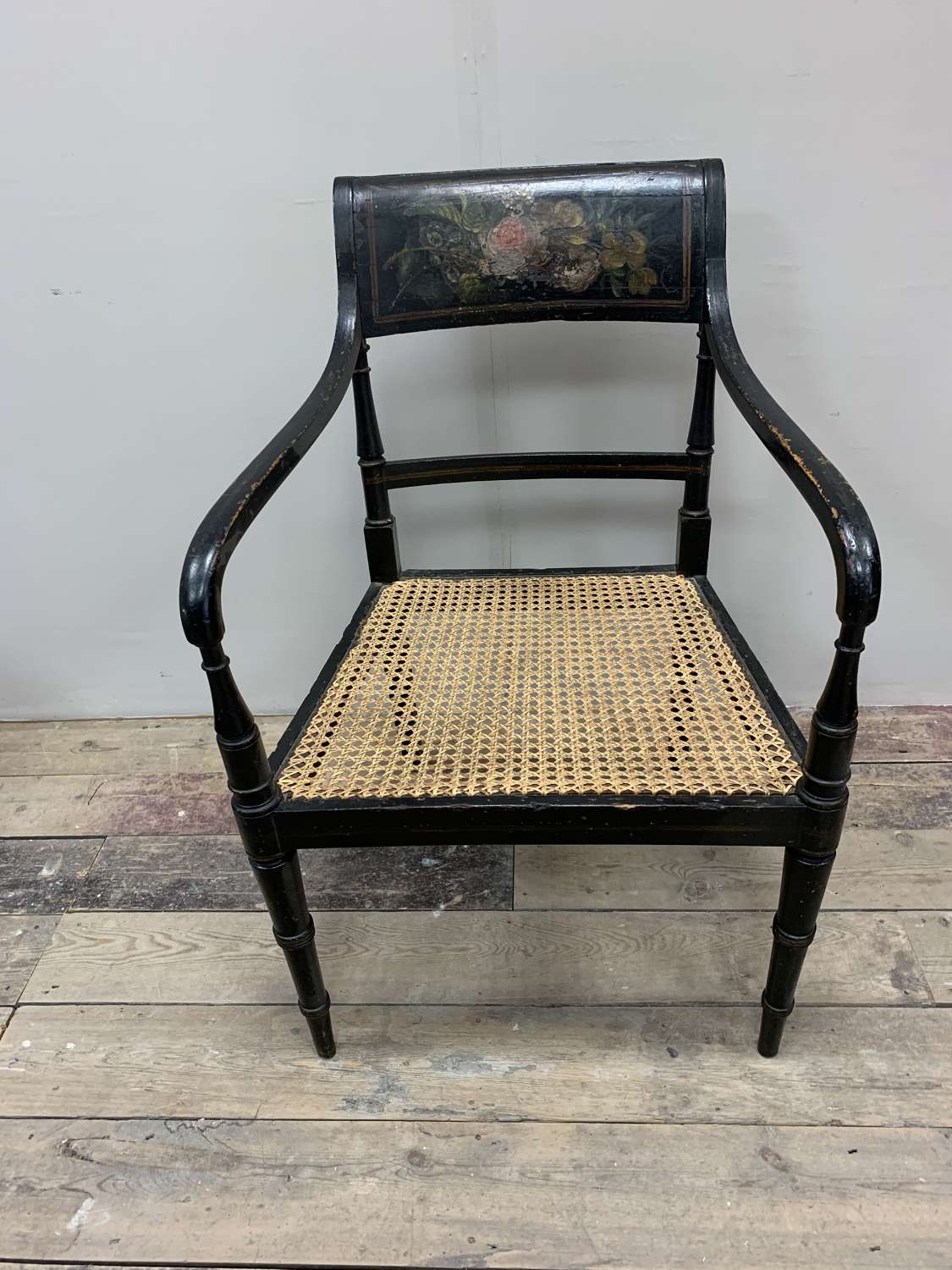 C19th Century painted chair with flower decoration and caned seat