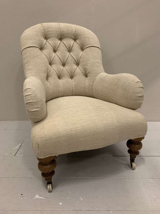 19th century  upholstered English armchair with buttoned back