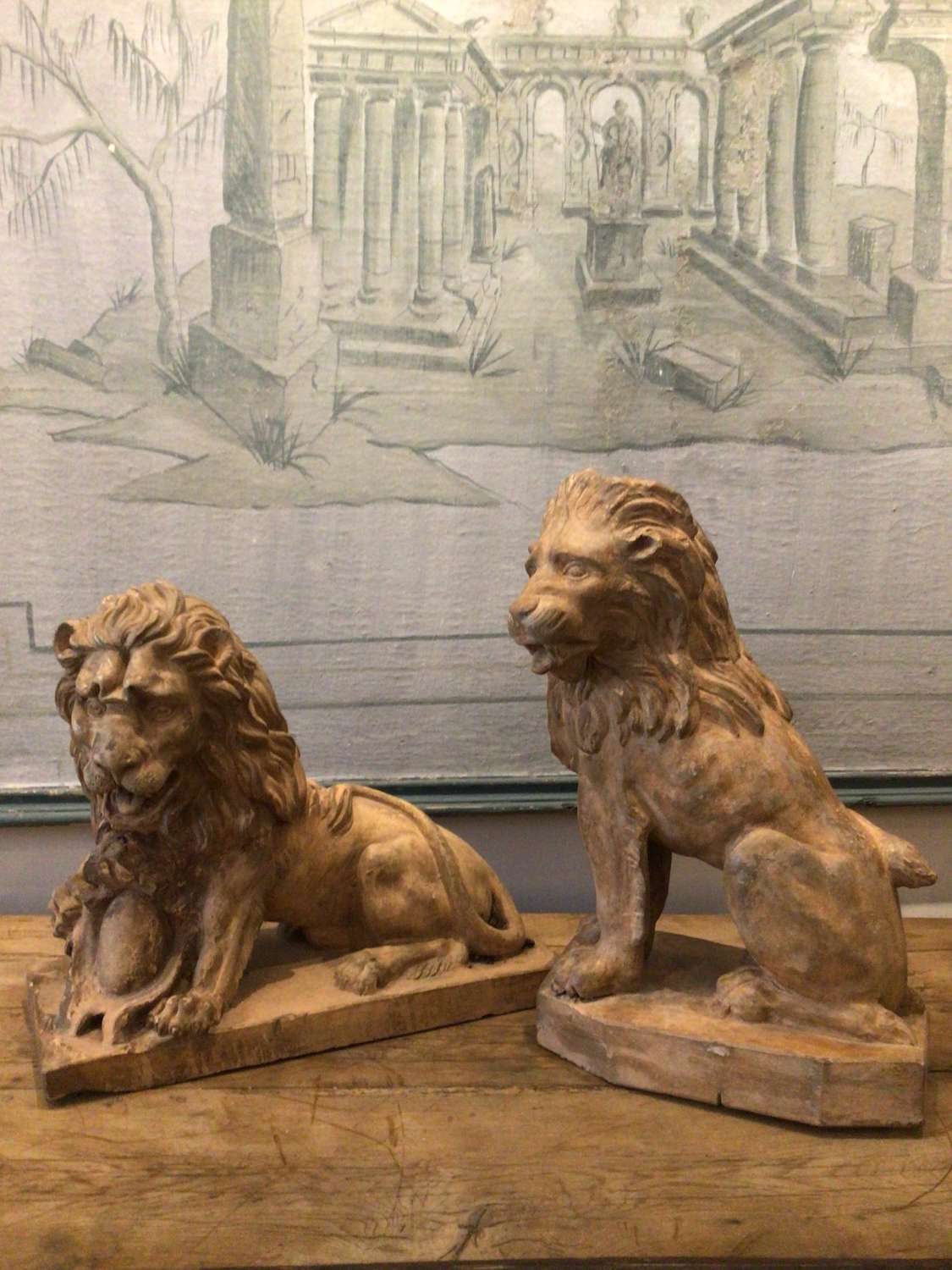 Early C19th pair of french large terracotta lions