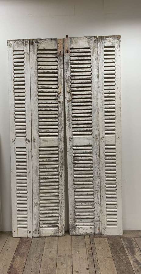 C1900s pair of painted french two part shutters