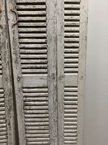 C1900s pair of painted french two part shutters