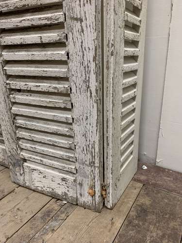 C1900s pair of painted french two part shutters