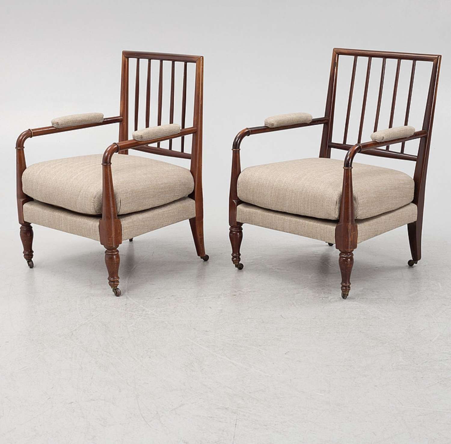 C1900s pair of spindle back upholstered mahogany Swedish armchairs