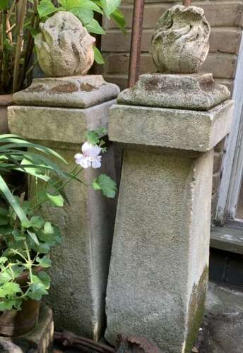 1910 pair of stone posts with flame finials