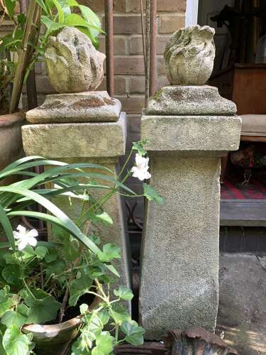 1910 pair of stone posts with flame finials