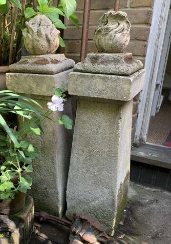 1910 pair of stone posts with flame finials